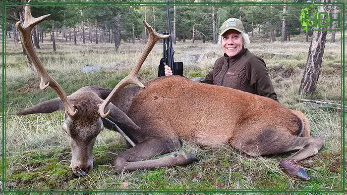 Huntress-with-Red-deer-trophy